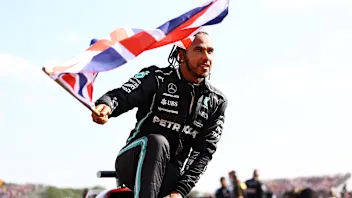NORTHAMPTON, ENGLAND - JULY 18: Race winner Lewis Hamilton of Great Britain and Mercedes GP