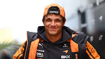 ZANDVOORT, NETHERLANDS - AUGUST 20: Lando Norris of Great Britain and McLaren walks in the Paddock
