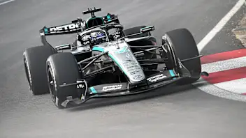 SINGAPORE, SINGAPORE - OCTOBER 09: George Russell of Great Britain driving the (63) Mercedes AMG