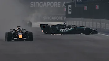 SINGAPORE, SINGAPORE - OCTOBER 10: Max Verstappen of the Netherlands driving the (3) Oracle Red