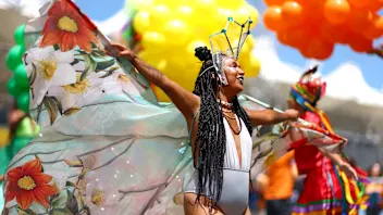 SAO PAULO, BRAZIL - NOVEMBER 05: A dancer performs on the grid prior to the F1 Grand Prix of Brazil