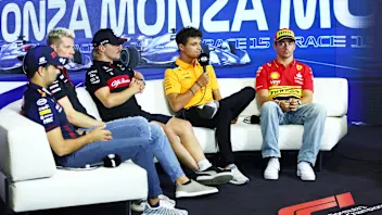 MONZA, ITALY - AUGUST 31: Sergio Perez of Mexico and Oracle Red Bull Racing, Nico Hulkenberg of