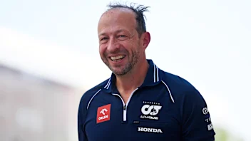 SINGAPORE, SINGAPORE - SEPTEMBER 16: Peter Bayer, CEO of Scuderia AlphaTauri looks on in the garage