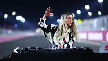 LUSAIL CITY, QATAR - OCTOBER 07: DJ Nana performs on the grid prior to the Sprint ahead of the F1