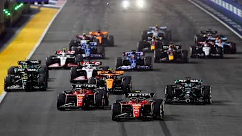 SINGAPORE, SINGAPORE - SEPTEMBER 17: Carlos Sainz of Spain driving (55) the Ferrari SF-23 leads