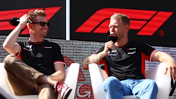 SPIELBERG, AUSTRIA - JUNE 29: Nico Hulkenberg of Germany and Haas F1 and Kevin Magnussen of Denmark