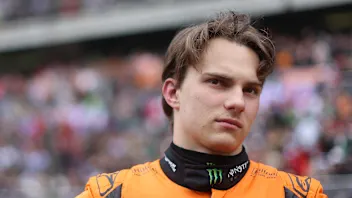 SHANGHAI, CHINA - APRIL 21: Oscar Piastri of Australia and McLaren looks on, on the grid prior to