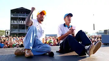 NORTHAMPTON, ENGLAND - JULY 06: Lewis Hamilton of Great Britain and Mercedes and George Russell of