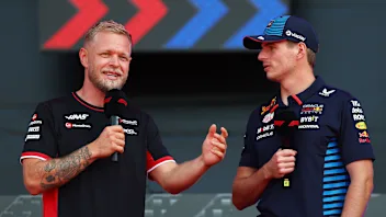 MONZA, ITALY - AUGUST 31: Kevin Magnussen of Denmark and Haas F1 and Max Verstappen of the