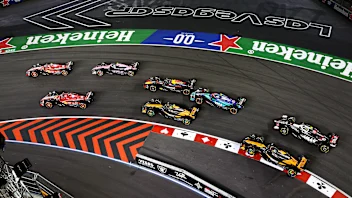 LAS VEGAS, NEVADA - NOVEMBER 23: Carlos Sainz of Spain driving (55) the Ferrari SF-24 leads Charles