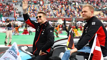 MEXICO CITY, MEXICO - OCTOBER 27: Nico Hulkenberg of Germany and Haas F1 and Kevin Magnussen of