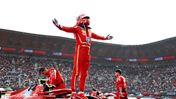 MEXICO CITY, MEXICO - OCTOBER 27: Race winner Carlos Sainz of Spain and Ferrari celebrates in parc