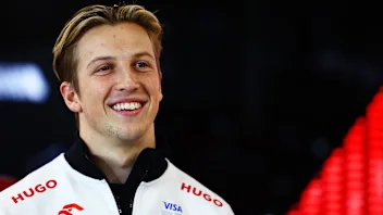 LUSAIL CITY, QATAR - DECEMBER 01: Liam Lawson of New Zealand and Visa Cash App RB looks on from the