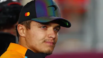 LUSAIL CITY, QATAR - DECEMBER 01: Lando Norris of Great Britain and McLaren looks on from the