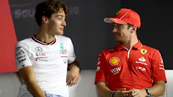 JEDDAH, SAUDI ARABIA - MARCH 06: George Russell of Great Britain and Mercedes and Charles Leclerc