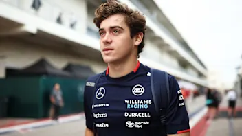 AUSTIN, TEXAS - OCTOBER 18: Franco Colapinto of Argentina and Williams walks in the Paddock prior