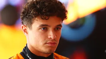 AUSTIN, TEXAS - OCTOBER 18: Lando Norris of Great Britain and McLaren looks on in the garage during
