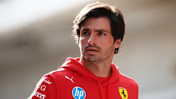 AUSTIN, TEXAS - OCTOBER 17: Carlos Sainz of Spain and Ferrari looks on in the Paddock during