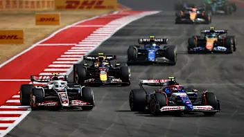 AUSTIN, TEXAS - OCTOBER 19: Yuki Tsunoda of Japan driving the (22) Visa Cash App RB VCARB 01 leads