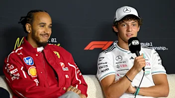 MELBOURNE, AUSTRALIA - MARCH 13: Lewis Hamilton of Great Britain and Scuderia Ferrari and Andrea