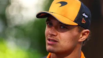 MELBOURNE, AUSTRALIA - MARCH 13: Lando Norris of Great Britain and McLaren looks on during previews