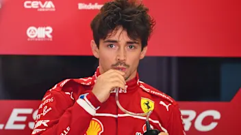SHANGHAI, CHINA - MARCH 21: Charles Leclerc of Monaco and Scuderia Ferrari looks on in the garage