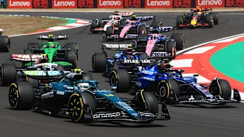 SHANGHAI, CHINA - MARCH 22: Fernando Alonso of Spain driving the (14) Aston Martin F1 Team AMR25