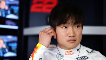 SUZUKA, JAPAN - APRIL 04: Yuki Tsunoda of Japan and Oracle Red Bull Racing looks on in the garage