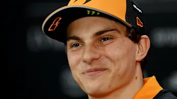 SINGAPORE, SINGAPORE - OCTOBER 02: Oscar Piastri of Australia and McLaren talks to the media during