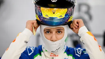 SINGAPORE, SINGAPORE - OCTOBER 04: Isack Hadjar of France and Visa Cash App Racing Bulls prepares