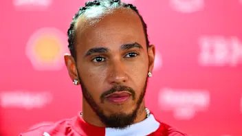 SPIELBERG, AUSTRIA - JUNE 26: Lewis Hamilton of Great Britain and Scuderia Ferrari is interviewed