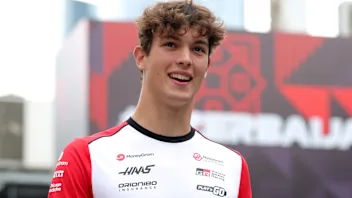 BAKU, AZERBAIJAN - SEPTEMBER 18: Oliver Bearman of Great Britain and Haas F1 walks in the Paddock
