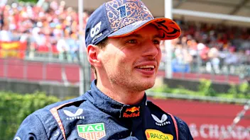 SPA, BELGIUM - JULY 26: Max Verstappen of the Netherlands and Oracle Red Bull Racing talks with his