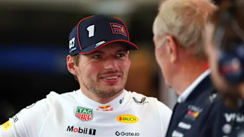 NORTHAMPTON, ENGLAND - JULY 05: Max Verstappen of the Netherlands and Oracle Red Bull Racing talks