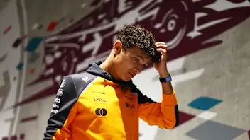 BUDAPEST, HUNGARY - AUGUST 01: Lando Norris of Great Britain and McLaren arrives in the Paddock