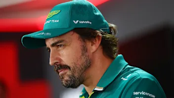 BUDAPEST, HUNGARY - JULY 31: Fernando Alonso of Spain and Aston Martin F1 Team talks to the media