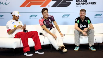 MIAMI, FLORIDA - MAY 01: Lewis Hamilton of Great Britain and Scuderia Ferrari, George Russell of