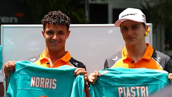MIAMI, FLORIDA - MAY 01: Lando Norris of Great Britain and McLaren arrives in the Paddock during