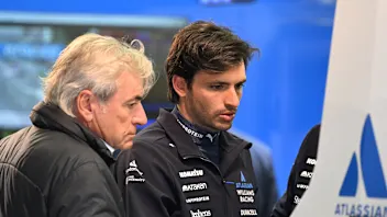 BAHRAIN, BAHRAIN - FEBRUARY 27: Carlos Sainz of Spain and Williams and Carlos Sainz Sr look on in