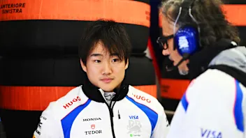 BAHRAIN, BAHRAIN - FEBRUARY 27: Yuki Tsunoda of Japan and Visa Cash App Racing Bulls talks with