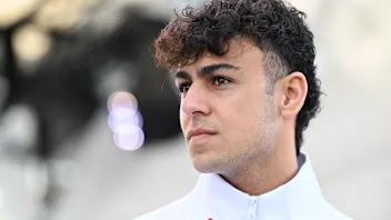 SUZUKA, JAPAN - MARCH 28: Arvid Lindblad of Great Britain and Visa Cash App Racing Bulls looks on