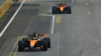 SINGAPORE, SINGAPORE - OCTOBER 10: Oscar Piastri of Australia driving the (81) McLaren MCL40
