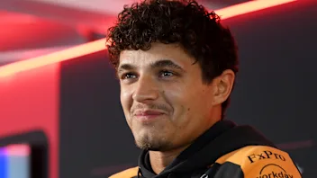 SPIELBERG, AUSTRIA - JUNE 27: Lando Norris of Great Britain and McLaren Mastercard F1 Team answers