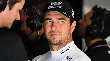 SPIELBERG, AUSTRIA - JUNE 27: Sergio Perez of Mexico and Cadillac F1 Team looks on in the garage