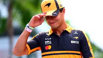 KUALA LUMPUR, MALAYSIA - OCTOBER 01: Lando Norris of Great Britain and McLaren walks in the Paddock