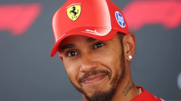 SPA, BELGIUM - JULY 16: Lewis Hamilton of Great Britain and Scuderia Ferrari talks to the media
