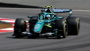 NORTHAMPTON, ENGLAND - JULY 03: Fernando Alonso of Spain driving the (14) Aston Martin F1 Team