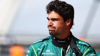NORTHAMPTON, ENGLAND - JULY 03: Lance Stroll of Canada and Aston Martin F1 Team looks on during