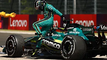 BUDAPEST, HUNGARY - JULY 24: Lance Stroll of Canada and Aston Martin F1 Team climbs out of his car