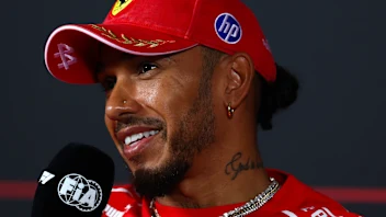 MONZA, ITALY - SEPTEMBER 03: Lewis Hamilton of Great Britain and Scuderia Ferrari speaks in the